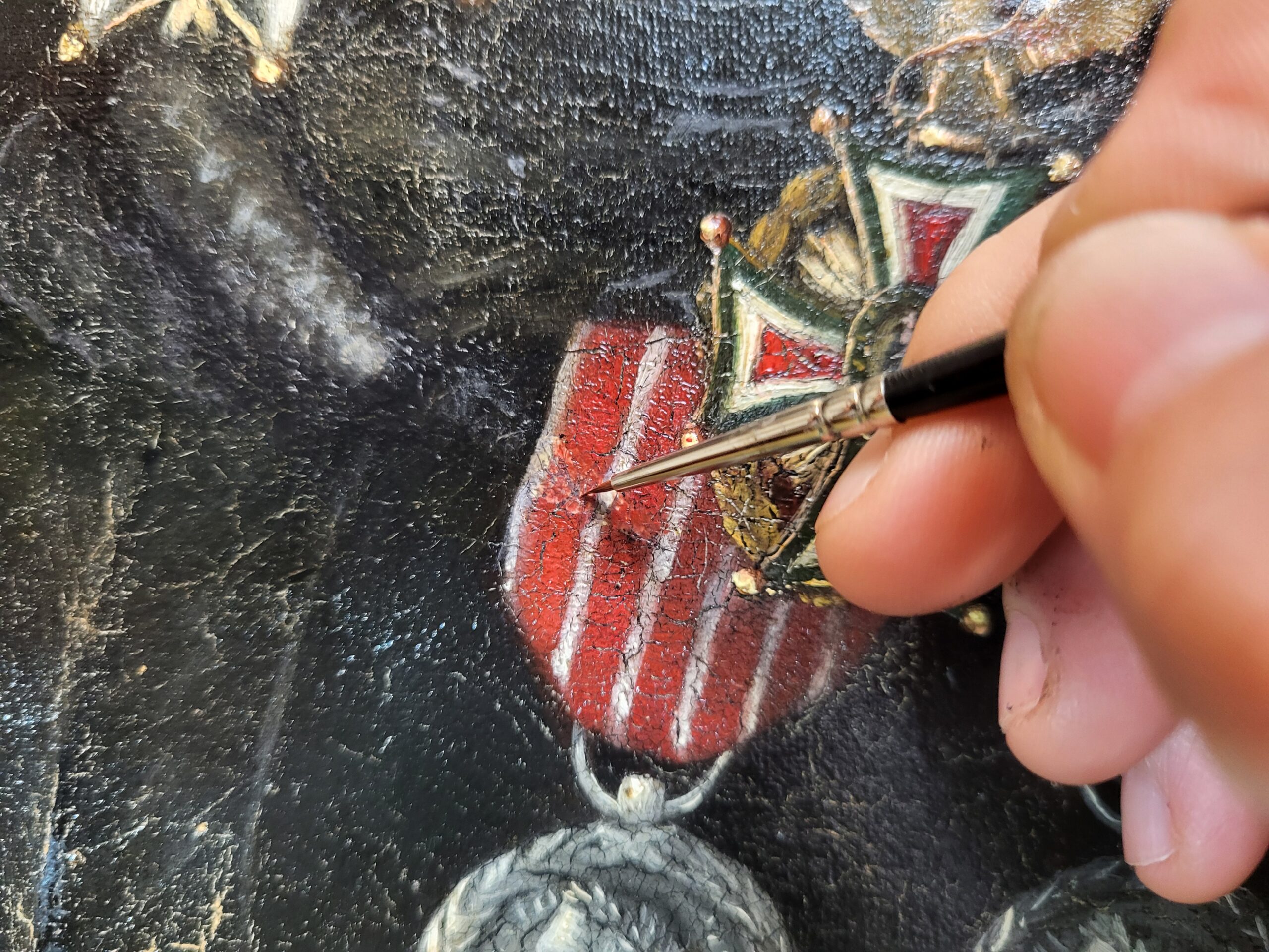 Restauration des décorations du tableau de Loizillon